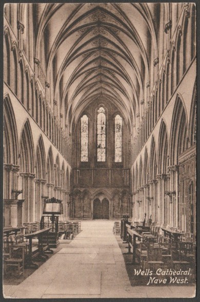 Printed sepia postcard showing a view of the west nave of Wells Cathedral in Somerset.
Published by F. Frith & Co Ltd, Reigate, No 2562B, c.1910.
Postally unused.
Very good condition, with slight corner bumps.