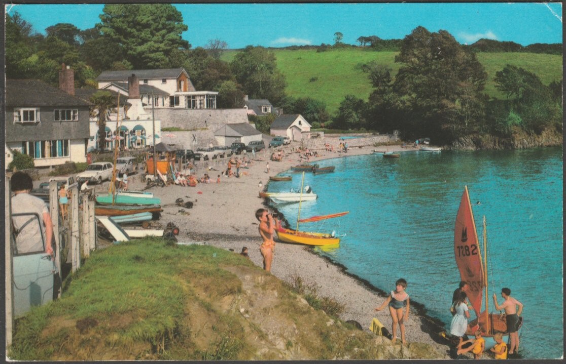 Printed colour postcard showing a view of the river beach at Helford in Cornwall.
Publisher not stated, probably Photo Precision, No PT889, c.1970.
Postally unused.
Good condition, with very slight corner bumps, but tiny crease to top right corner.